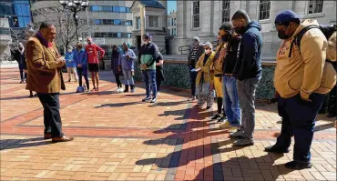  ?? EILEEN MCCLORY PHOTOS / DAYTON DAILY NEWS ?? Bishop Jerome McCorry, a founder and president of the National Congress on Faith and Social Justice, leads a prayer during a protest against racism Saturday at Courthouse Square in Dayton.