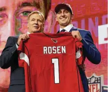  ?? David J. Phillip / Associated Press ?? UCLA's Josh Rosen, right, becomes the fourth QB taken in the top 10 when the Cardinals move up to the 10th pick to grab him.