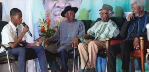  ??  ?? L-R: A student of Ijaw National Academy during a question and answer session with Prof. Joe Alagoa, Dr. Gabriel Okara and Prof. Wole Soyinka. Over 1,000 students of Ijaw descent were present