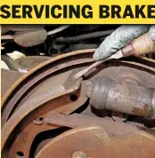  ??  ??  If you are not fitting new brake 13 shoes, use a screwdrive­r to clean the leading edges of the braking material. This is where brake dust can build up and reduce braking effort. Lift each brake shoe away from the backplate and scrape off any corrosion.