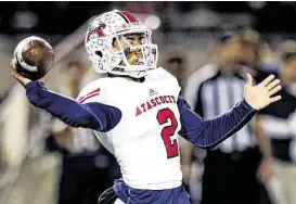  ?? Brett Coomer / For the Chronicle ?? Atascocita quarterbac­k Daveon Boyd was stellar Klein Collins as the Eagles beat the Tigers 32-27 in the Class 6A Division I Bi-District playoffs last weekend.