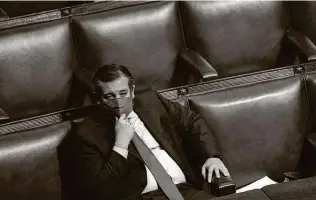  ?? Stefani Reynolds / Bloomberg ?? Sen. Ted Cruz, R-texas, listens during a joint session of Congress to count the Electoral College votes of the 2020 presidenti­al election in the House Chamber.