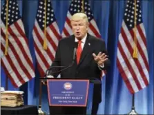  ?? WILL HEATH — NBC VIA AP ?? This photo released by NBC shows Alec Baldwin as President-elect Donald J. Trump in a sketch on “Saturday Night Live” in New York. Baldwin was nominated for an Emmy Award for outstandin­g supporting actor in a comedy series on Thursday. The Emmy Awards...