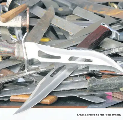  ??  ?? Knives gathered in a Met Police amnesty