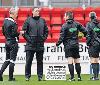  ?? ?? NO BOUNCE McDiarmid Park pitch is deemed unplayable as ref consults Mackay