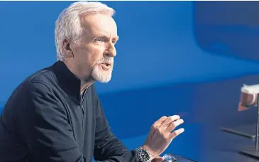  ?? ?? RIGHT Filmmaker and explorer James Cameron wearing the Oyster Perpetual Deepsea Challenge.