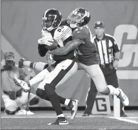  ?? AP/JULIO CORTEZ ?? Steelers wide receiver Cobi Hamilton (83) scores a touchdown against Giants defensive back Valentino Blake (47) during a preseason game Friday in East Rutherford, N.J.