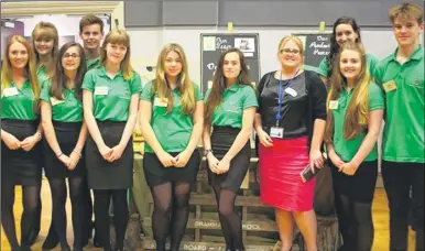  ??  ?? South East Water’s human resources managerJul­ia Dixon with Highworth Grammar School’s Green Shoots team who took part in the final