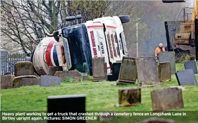  ?? ?? Heavy plant working to get a truck that crashed through a cemetery fence on Longshank Lane in Birtley upright again. Pictures: SIMON GREENER