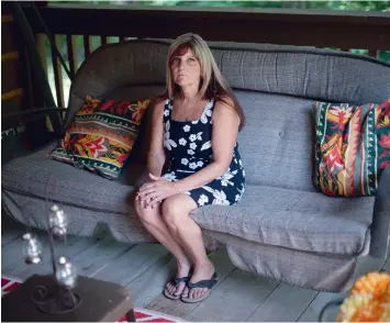  ?? MATHEW MCCARTHY WATERLOO REGION RECORD ?? Cindy Buckley sits in a rocking chair she used to share with her husband, Ron.