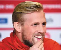  ??  ?? Kasper Schmeichel sees the lighter side while chatting to the media yesterday