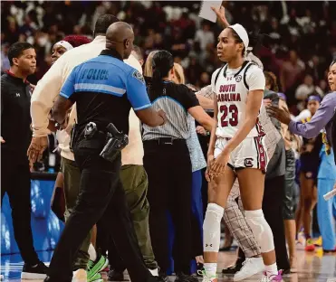  ?? Chris Carlson/associated Press ?? The fight that broke out late in Sunday's South Carolina-lsu women's game at the SEC tournament in Greenville, S.C., resulted in six players being ejected and a chaotic scene.