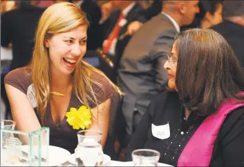  ?? Autumn Driscoll / Autumn Driscoll ?? Marcella Kovac talks with Angela DeMello during the Bridgeport Regional Business Council's Annual Meeting and Luncheon on June 1, 2014.