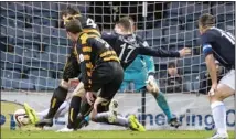  ??  ?? LATE BUT GREAT: Gordon slams home the Alloa equaliser at Dens Park yesterday to leave home fans in a flap with boss John Brown