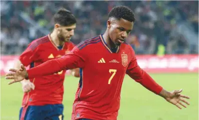  ?? (AFP) ?? Spain’s Ansu Fati (right) celebrates scoring during the friendly match against Jordan at the Hussein Youth City Stadium in Amman yesterday.