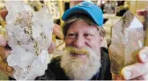  ?? ?? Collector Jimmy Reedyk displays a pair of quartz crystals during the show.