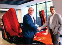  ?? ?? Above: Paul Harris, MD, APAC and China, McLaren Automotive (L) and Lalit Choudhary, chairman and MD, McLaren Mumbai (R) pose with 765LT Spider