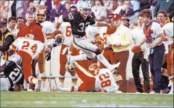  ?? The Associated Press ?? Raiders running back Marcus Allen ran for 191 yards and three TDS on 20 carries en route to game MVP honors in a 38-9 win over Washington in Super Bowl XVIII.