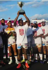  ??  ?? Triumphant … the Kokoda Cup in the hands of the PNG Hunters after a big win over the Townsville Blackhawks.