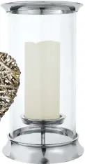  ??  ?? £42 Create a cosy glow with this pillar lantern, NEXT
