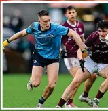  ?? ?? FOCUS: Galway’s Dylan McHugh and Dublin’s Ross McGarry (main) and (above) Cillian Ó Curraoin of Galway against Tom Lahiff of Dublin
