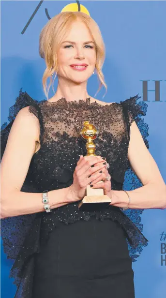  ?? Picture: AFP ?? GLOWING: Actor Nicole Kidman poses with her Golden Globe for Big Little Lies.