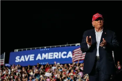  ?? Brandon Bell/Getty Images ?? An invite to a Donald Trump fundraiser in Florida showed the breakdown of where donations would go, with Trump’s campaign and his Save America Pac getting the first cut before the Republican party. Photograph: