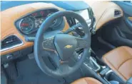  ??  ?? The 2018 Chevy Cruze has an attractive two-tone interior.