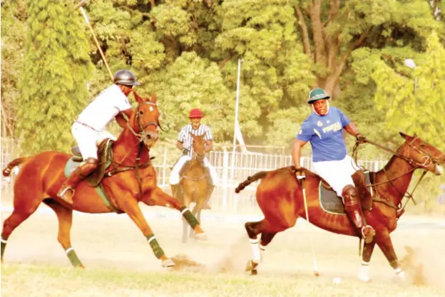  ??  ?? EL-Amin polo Patron, Mohammad Babangida (right) breaks away from Idris Badamasi of Rubicon at a recent polo tourney in Kaduna. Babangida tops the list of high profile polo patrons expected to showcase their skills at the forthcomin­g 2017 Abuja carnival...