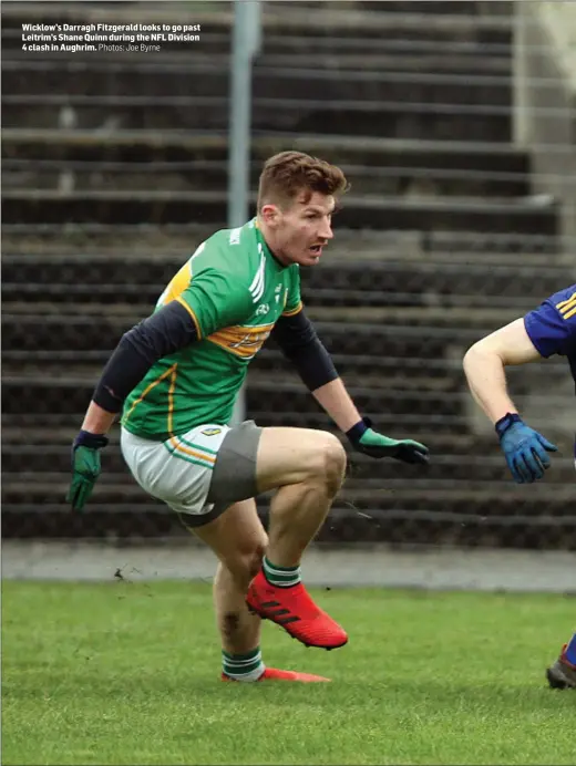  ??  ?? Wicklow’s Darragh Fitzgerald looks to go past Leitrim’s Shane Quinn during the NFL Division 4 clash in Aughrim.