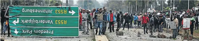  ?? Picture: MOELETSI MABE ?? ‘HOUSE US NOW!’ Police clashed with Eldorado Park residents, who protested against being evicted from Freedom Park last month. They want land allocated on which houses must be built for them