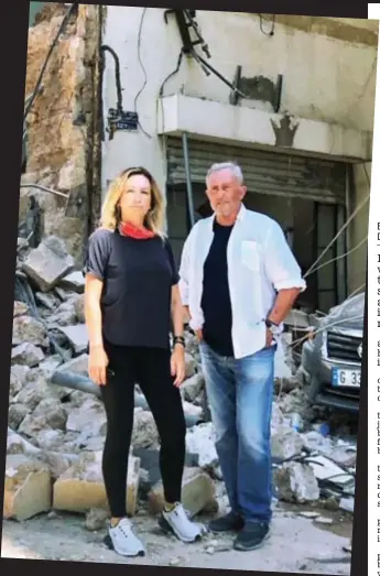  ??  ?? Aftermath: Brent Sadler and his wife Jelena amid the rubble yesterday