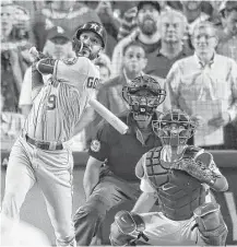  ?? Michael Ciaglo / Houston Chronicle ?? Marwin Gonzalez, who hadn’t driven in a run since Game 1 of the ALDS, connects for a ninth-inning homer off Kenley Jansen, creating a 3-3 tie in what became a 7-6 Astros win in 11 innings.