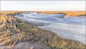  ?? CRAIG NORRIS PHOTO ?? Sunset on the Aulac River.