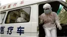  ??  ?? At the height of the SARS outbreak, China set up mobile fever clinics to screen local residents for the virus