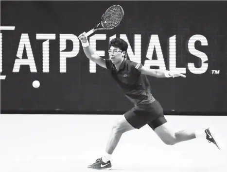  ?? AP Photo ?? Hyeon Chung, of South Korea, returns the ball to Andrey Rublev, of Russia, during the ATP Next Gen tennis tournament final, in Milan, Italy, Saturday, Nov. 11, 2017.