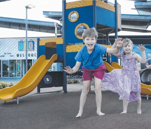  ?? Picture: ANNA ROGERS ?? PLAY TIME: Tyson Morgan, 10, and his sister Makayla, 5, enjoy the new playground at DFOOD at DFO Cairns.