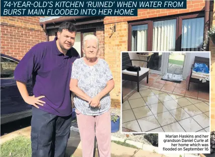  ??  ?? Marian Haskins and her grandson Daniel Curle at her home which was flooded on September 16