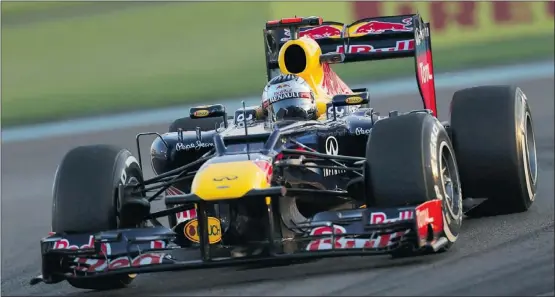  ?? — REUTERS ?? Red Bull Formula One driver Sebastian Vettel of Germany drives during the qualifying session of the Abu Dhabi Grand Prix at the Yas Marina circuit on Yas Island on Saturday.