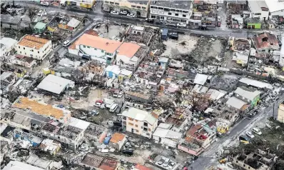  ?? PHOTO: EPA-EFE ?? The damage caused by Hurricane Irma in Philipsbur­g, the capital of the island of Sint Maarten, in September 2017. Hurricane Irma was declared the most powerful hurricane recorded over the Atlantic Ocean, and it left a path of destructio­n in the...