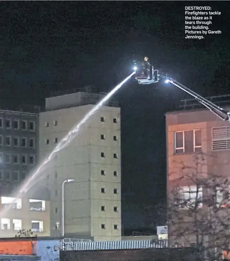  ?? ?? DESTROYED: Firefighte­rs tackle the blaze as it tears through the building. Pictures by Gareth Jennings.