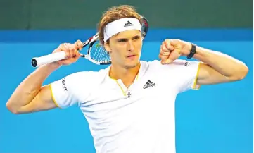  ?? — AFP photo ?? Alexander Zverev of Germany reacts after a point against Alex De Minaur of Australia during their men's singles tennis match in the Davis Cup World Group tie at the Pat Rafter Arena in Brisbane on February 2, 2018.