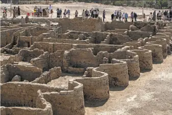  ?? Khaled Desouki / AFP / Getty Images ?? The 3,000yearold city uncovered in the southern province of Luxor dates back to Amenhotep III of the 18th dynasty, whose reign is considered a golden era for ancient Egypt.