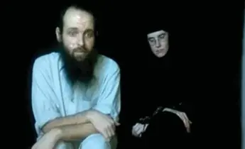  ?? THE ASSOCIATED PRESS FILE PHOTO ?? Josh Boyle and his wife Caitlan Coleman are shown in a hostage video received by their families.