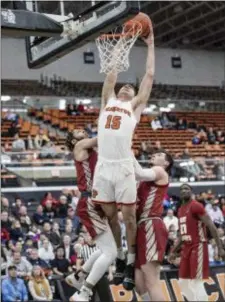  ?? JOHN BLAINE — FILE PHOTO — FOR THE TRENTONIAN ?? Princeton’s Ryan Schwieger (15) netted a career-high 15 points against Wesley.