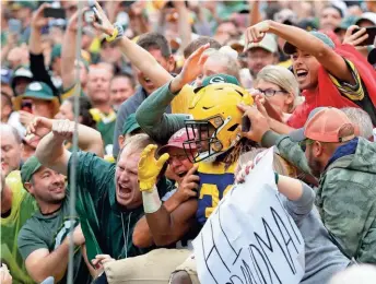  ?? RICK WOOD / JOURNAL SENTINEL ?? Packers running back Aaron Jones won’t be doing a Lambeau Leap with fans in the stands anytime soon because of the pandemic.