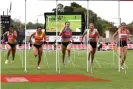  ?? Race. Photograph: Joel Carrett/AAP ?? Carla Bull (centre) reigned in the women’s