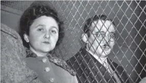  ??  ?? Ethel Rosenberg and husband Julius are separated by a wire screen as they ride to jail in New York on March 29, 1951, after their conviction as traitors in the nation’s first atomic-age spy trial. Associated Press file