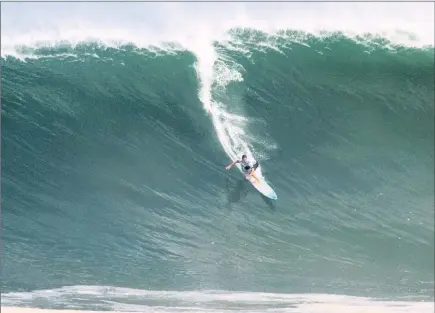  ?? PICTURE: WSL / MORALES ?? BIG WAVE: Grant Baker on his way to victory at last year’s Puerto Escondido Challenge.