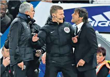  ??  ?? Boiling point: Jose Mourinho (left) and Antonio Conte had to be separated by fourth official Mike Jones last March